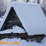 Russian bathhouse in the snowdrifts